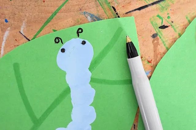 幼儿学画画：手指印画毛毛虫(步骤图解)