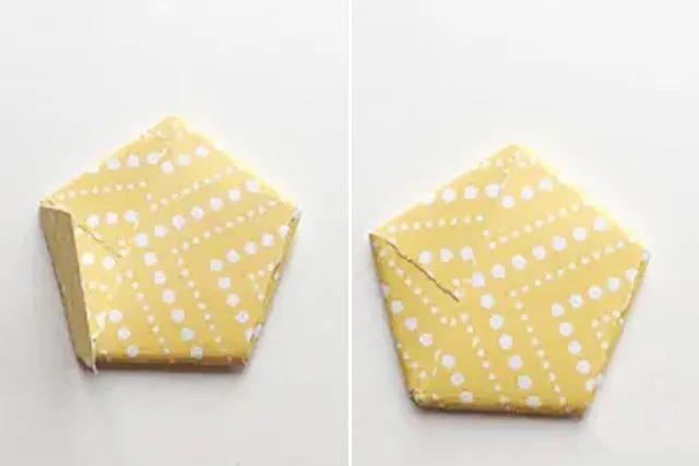 折纸生日帽，上面还用折纸星星装饰