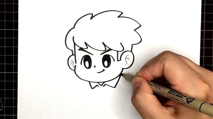 教你画一个踢足球的小男孩简笔画