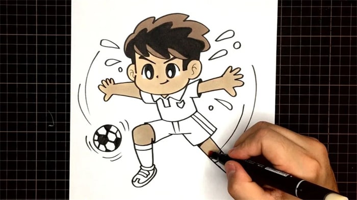 教你画一个踢足球的小男孩简笔画