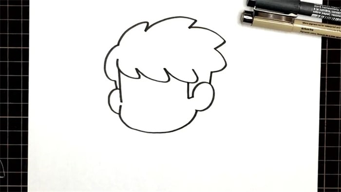 教你画一个踢足球的小男孩简笔画