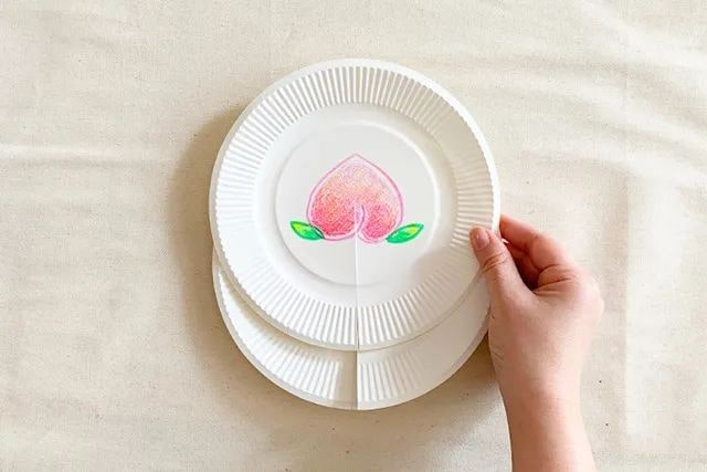 废物利用手工制作旋转纸盘子玩魔术拼图