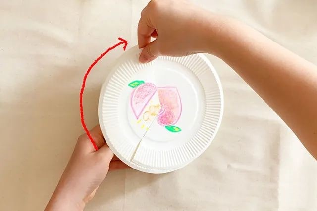 废物利用手工制作旋转纸盘子玩魔术拼图