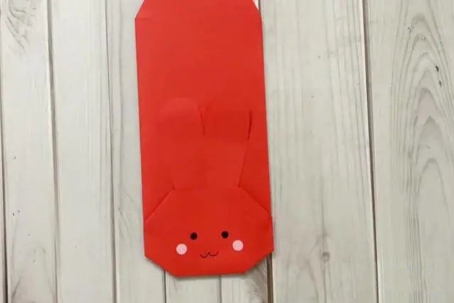 兔年儿童新年手工：折纸可爱的兔子红包(步骤图解)