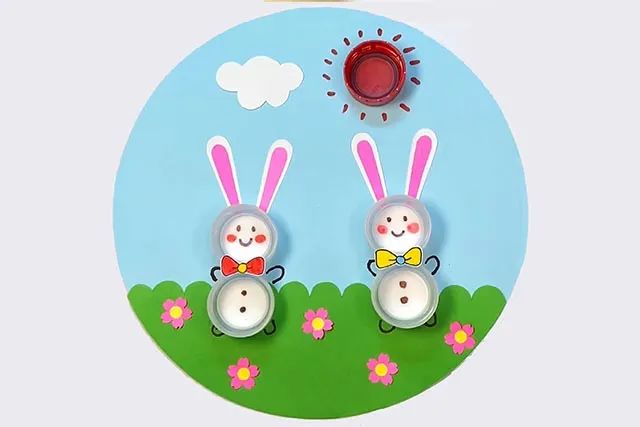 幼儿园废物利用手工：瓶盖制作兔子手工(步骤图解)