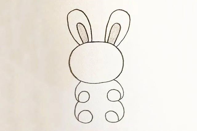 怎么画抱着胡萝卜的小兔子简笔画(步骤图解)