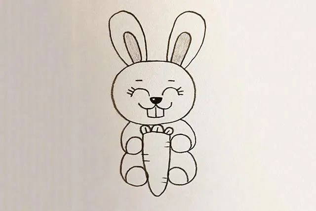 怎么画抱着胡萝卜的小兔子简笔画(步骤图解)
