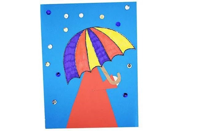 幼儿创意下雨天手工：拼贴画撑着伞的小女孩