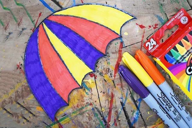 幼儿创意下雨天手工：拼贴画撑着伞的小女孩