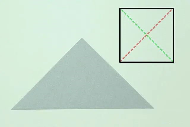 幼儿折纸手工简单：折纸坐着的小狗(步骤图解)