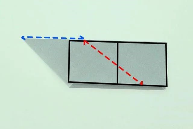 幼儿折纸手工简单：折纸坐着的小狗(步骤图解)