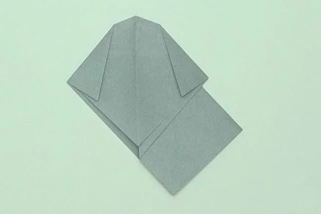 幼儿折纸手工简单：折纸坐着的小狗(步骤图解)