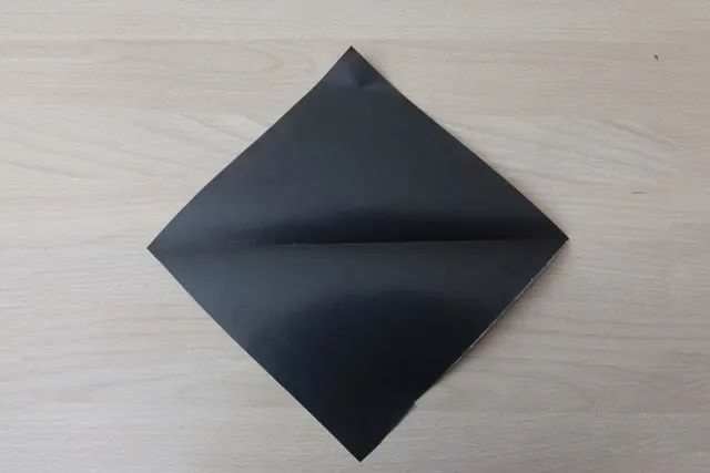 幼儿折纸手工简单小动物：怎么折纸坐着的小狗