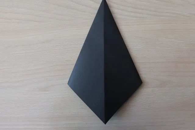 幼儿折纸手工简单小动物：怎么折纸坐着的小狗