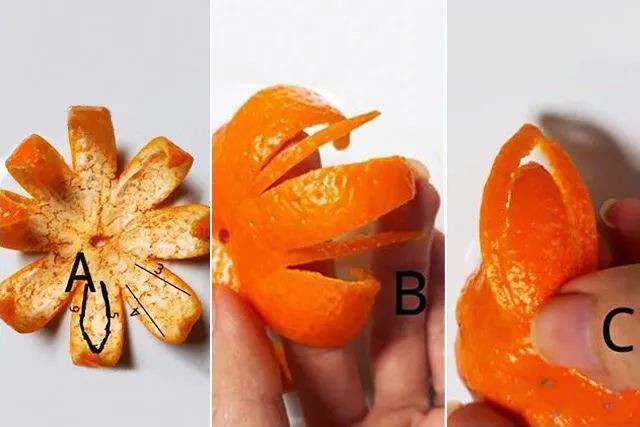 水果拼盘图片简单好看：用橘子做花朵造型水果拼盘