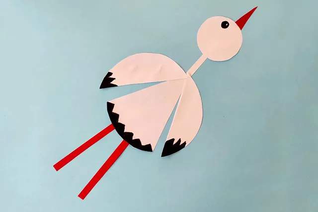 几何图形拼贴画：圆形纸贴画白鹤