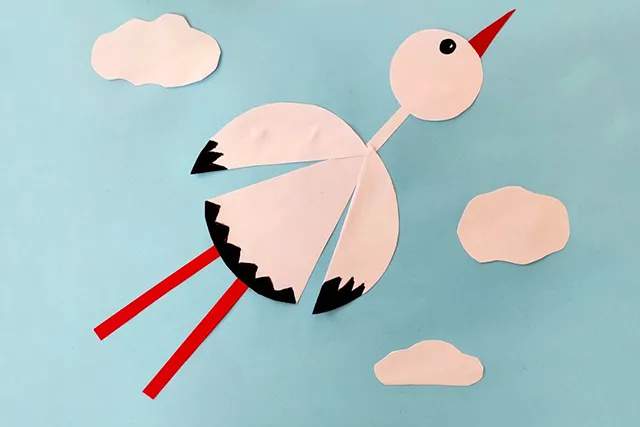 几何图形拼贴画：圆形纸贴画白鹤